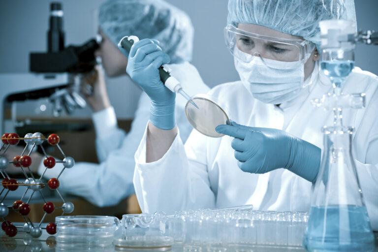 A women working in an engineering laboratory for microtechnology