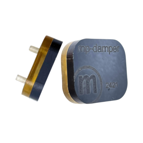 Picture of a small rectangular damper with two fluidic connections. Dampens pulsation, this allows flow sensors to measure more accurately.