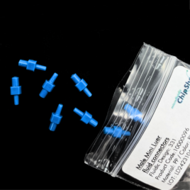 A bag of the small blue connectors being poured out.