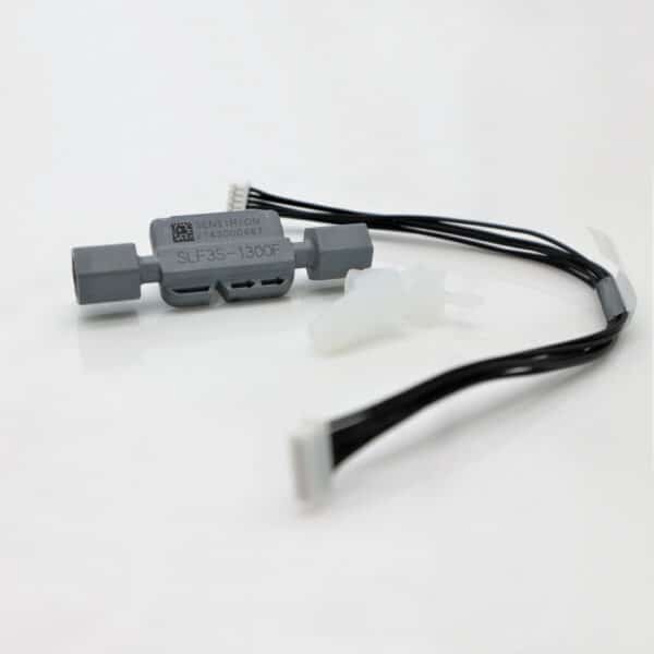 liquid flow sensor with two barb connections and a connection cable infront of a white background.